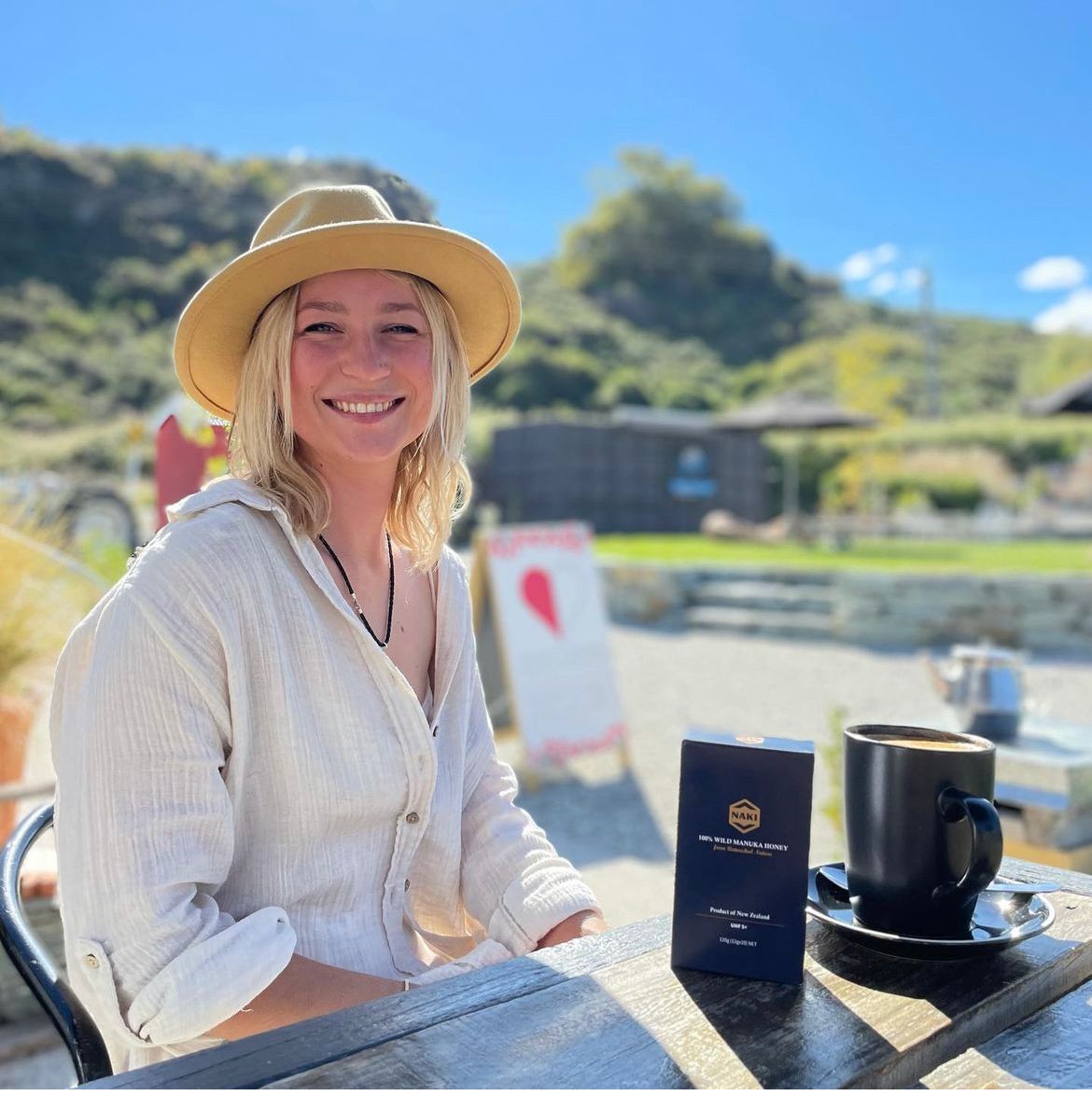 Woman enjoying her morning wellness ritual, inspired by the daily benefits of Naki mānuka honey